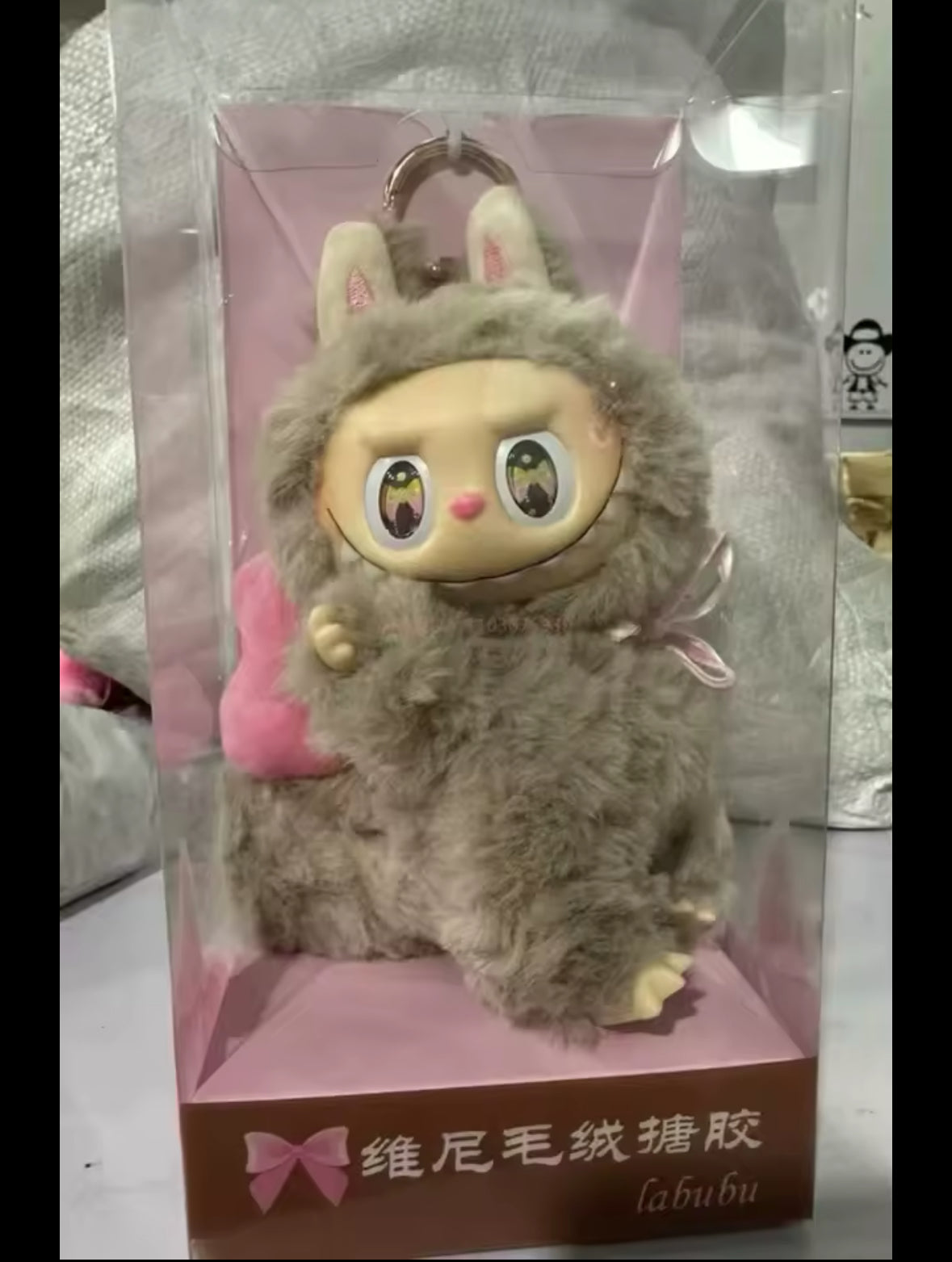 Labubu ojos de mariposa mystery box