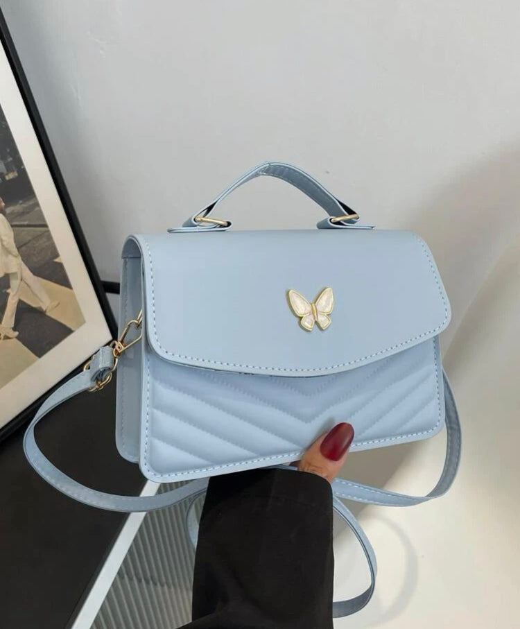 Cartera mariposa varios colores