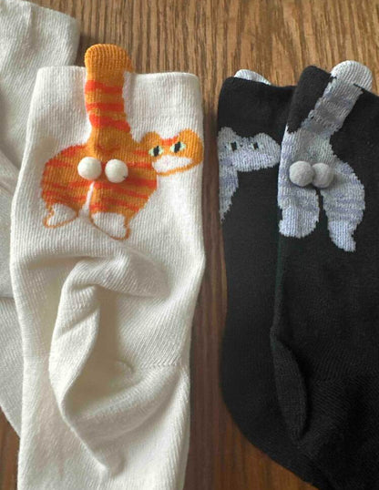 Medias de gatitos con bolitas
