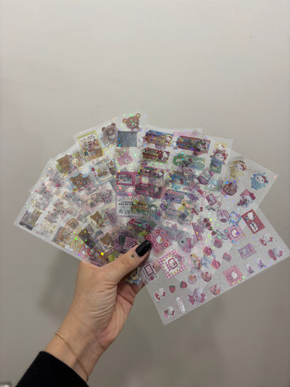 Stickers pusheen y hello kitty. Plancha al azar