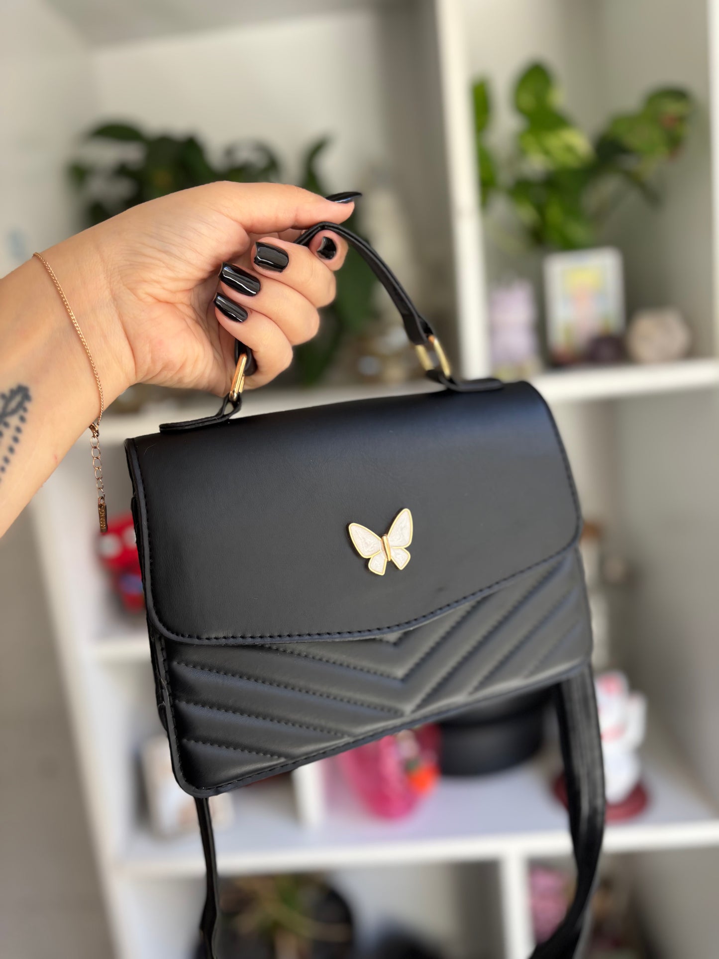 SORTEO CARTERA MARIPOSA NEGRA