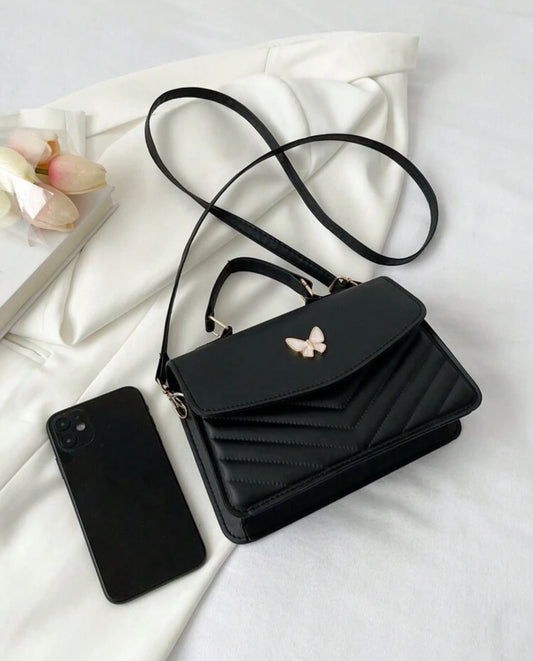 SORTEO CARTERA MARIPOSA NEGRA