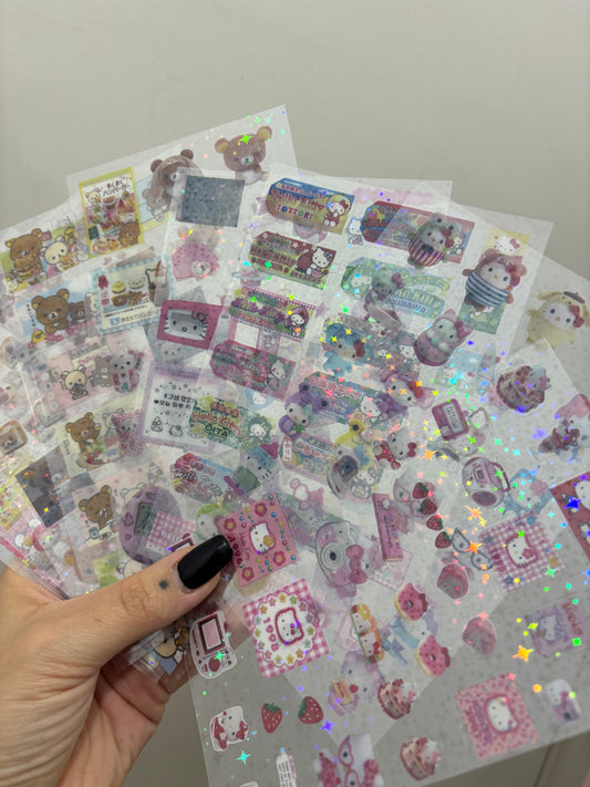Stickers pusheen y hello kitty. Plancha al azar
