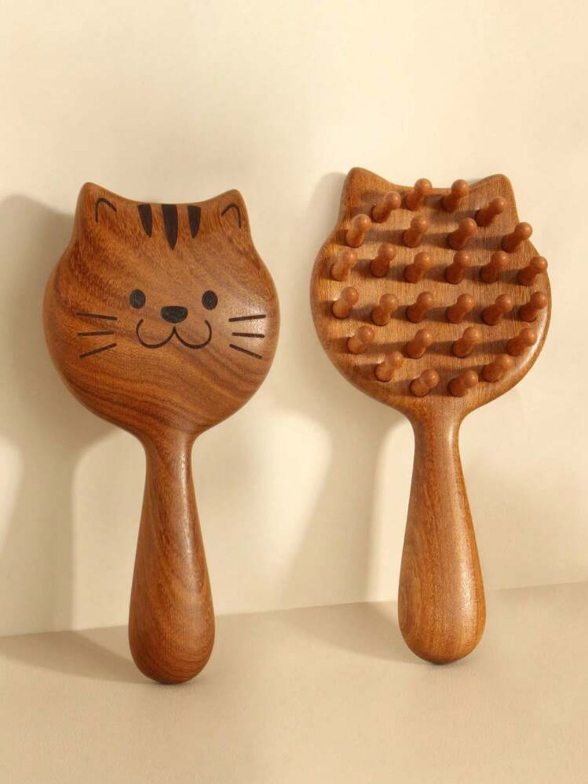 Peine masajeador de gatito